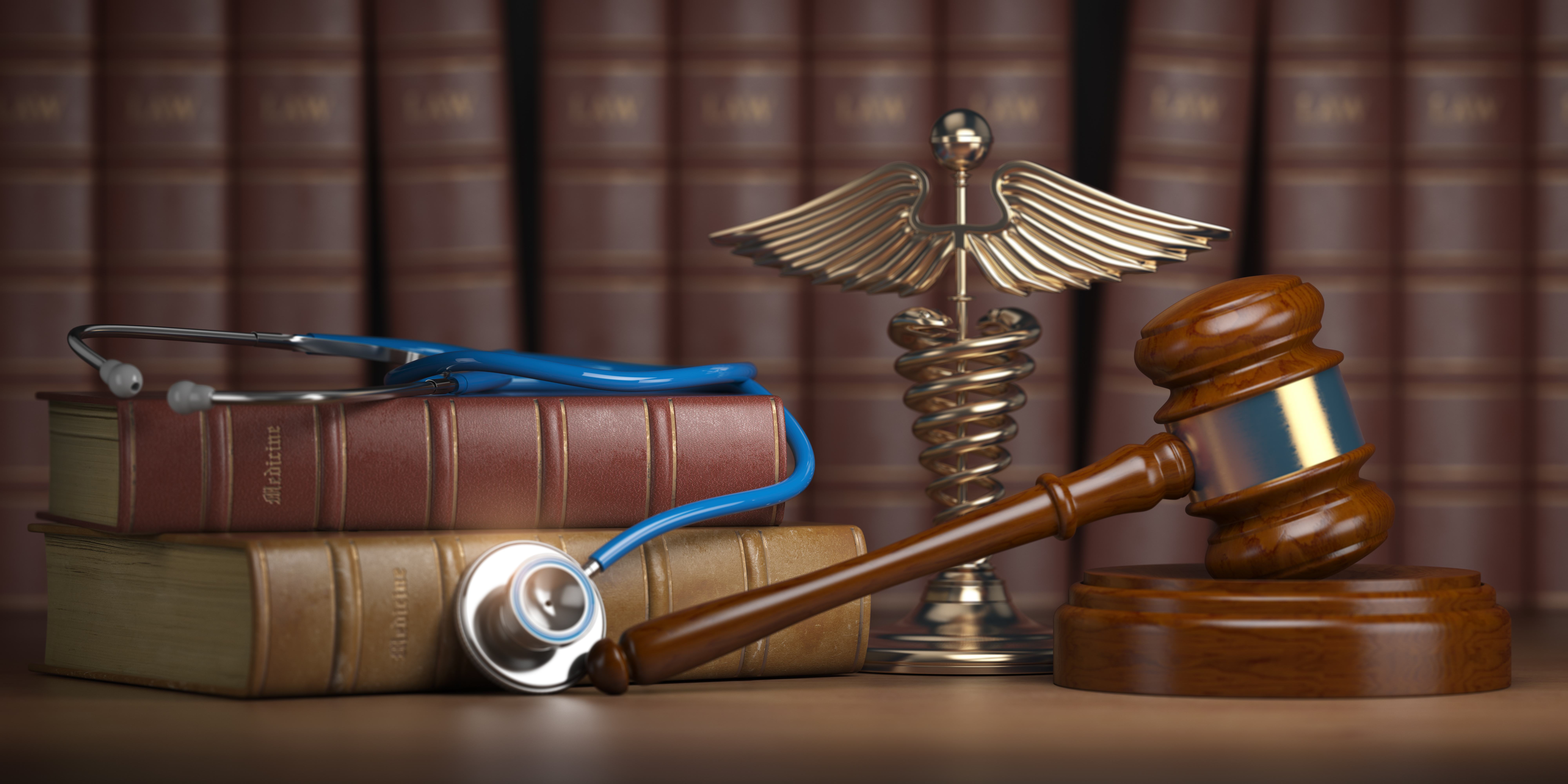 Gavel, stethoscope and caduceus sign on books background. Mediicine laws and legal, medical jurisprudence.