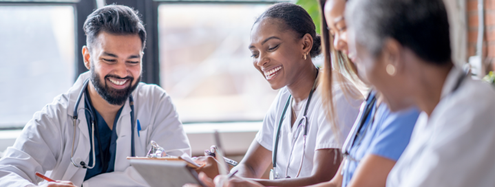 Doctors sitting at a table.