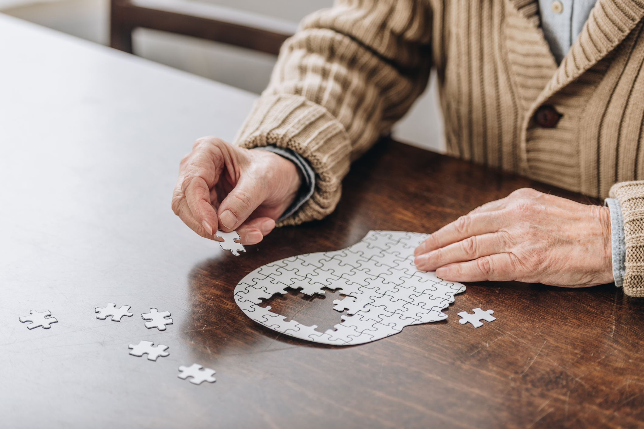 Person completing a puzzle.