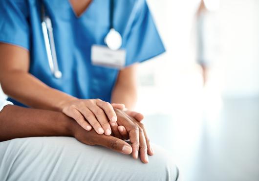 women providing care to patient.